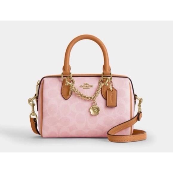 Coach Handbags - Coach Powder Pink Mini Rowan With Tea Rose Charm Authentic NWT CEK79 IN HAND